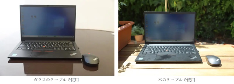 ThinkPad エッセンシャル ワイヤレスマウス 木とガラスのテーブルで使用